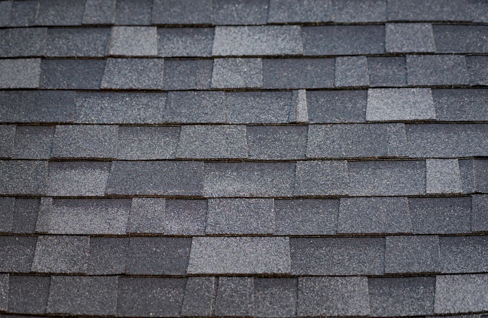 A pattern created by asphalt shingles on a roof.
