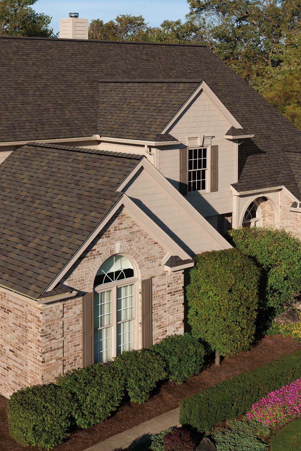a residential house with a garden