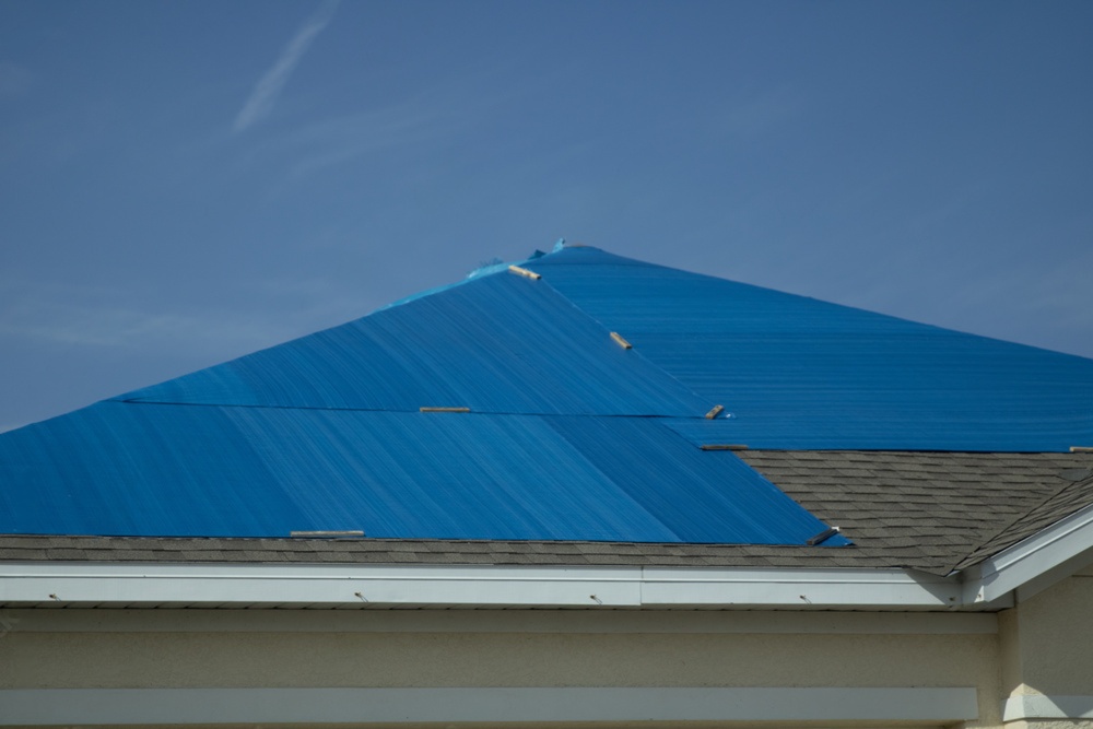 Roof tarping