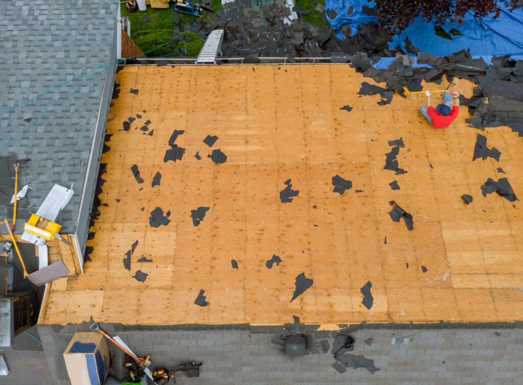 Removal of old roof and replacement with all new shingle being applied