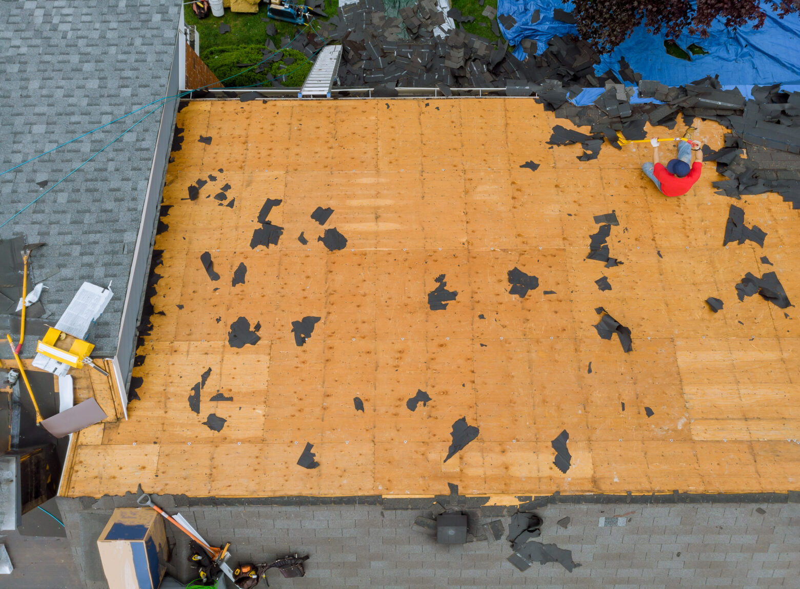 Removal of old roof and replacement with all new shingle being applied