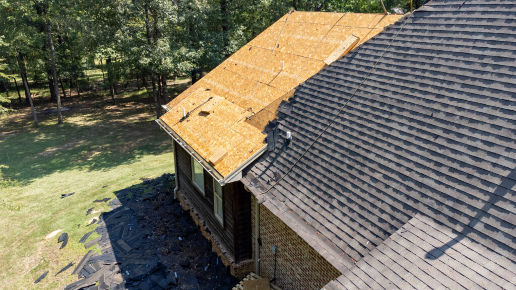 House with new roof being installed