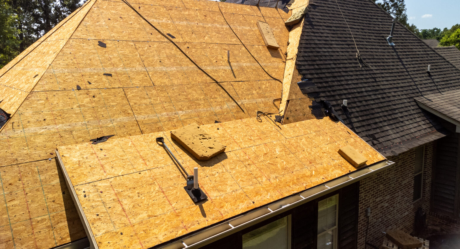 House with new roof being installed