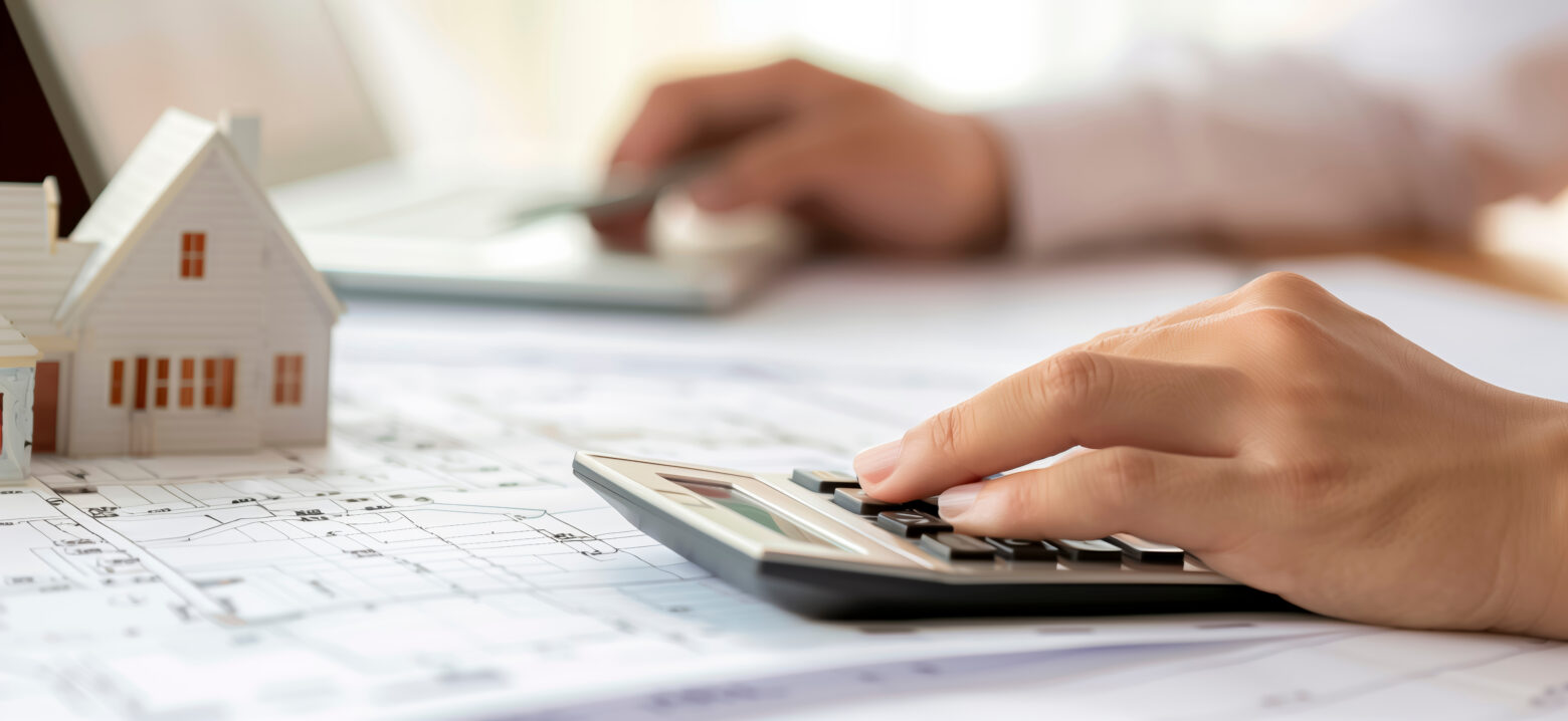 Banner, A person is using a calculator to calculate the roof cost